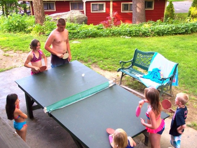 Family playing table tennis